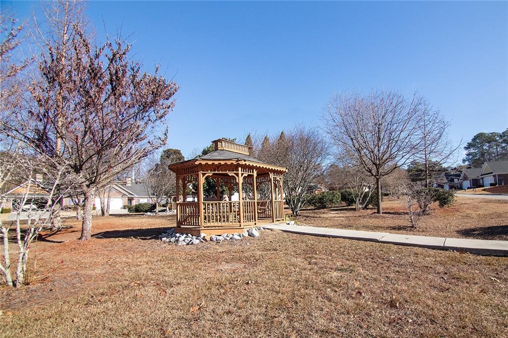 2545 Rosehill Circle Lithia Springs, GA 30122 - Photo 24 of 27 a front view of a house with a yard