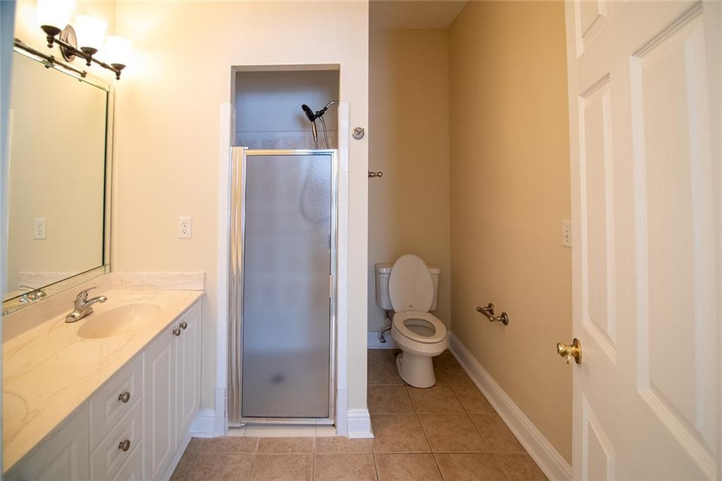 2545 Rosehill Circle Lithia Springs, GA 30122 - Photo 7 of 27 a bathroom with a sink and a mirror