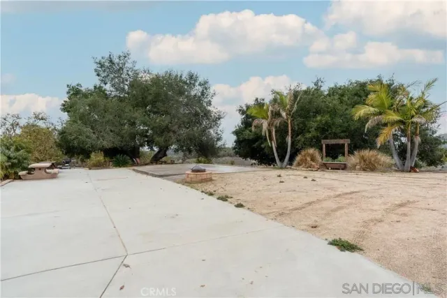 a view of a backyard of a house