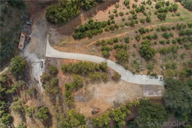 a view of backyard and house
