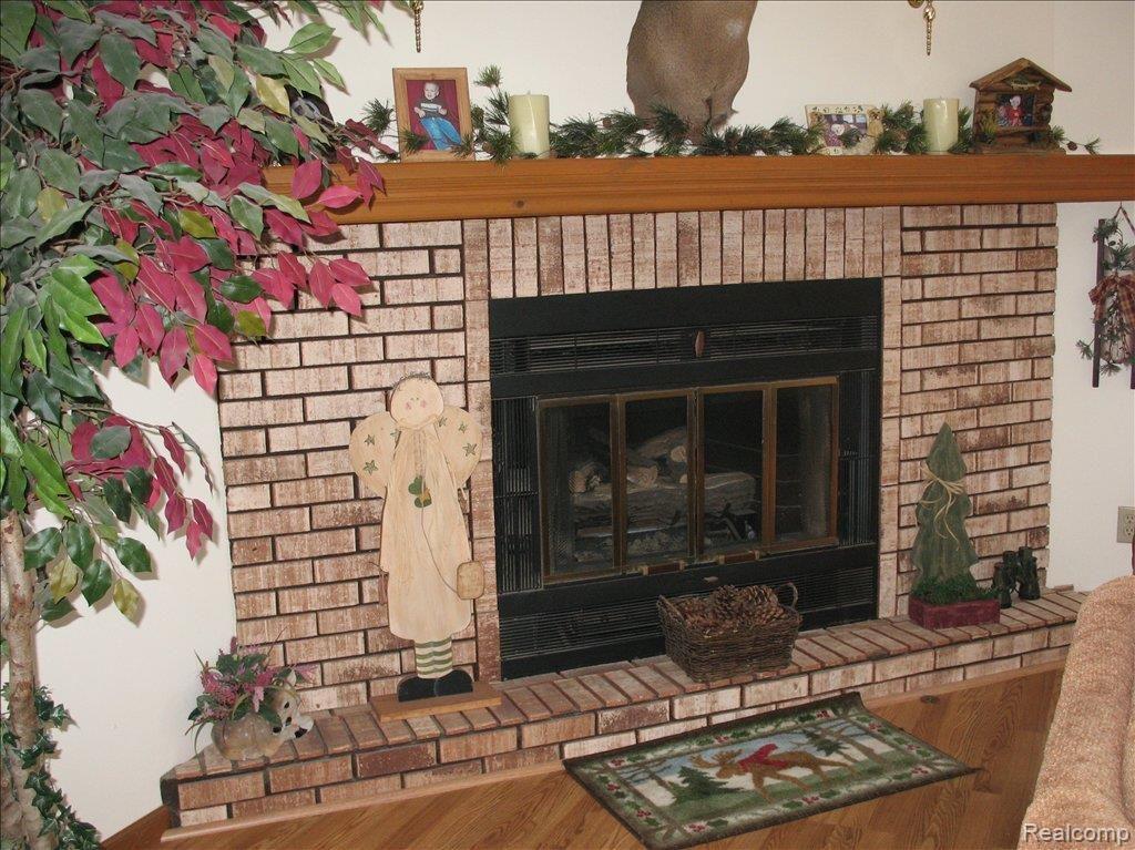 4619 Gregory Road Goodrich, MI 48438 - Photo 12 of 19 Cozy Fireplace
