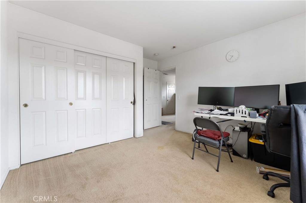 11390 Parkfield Court Riverside, CA 92505 - Photo 23 of 42 a view of a workspace with furniture and a window