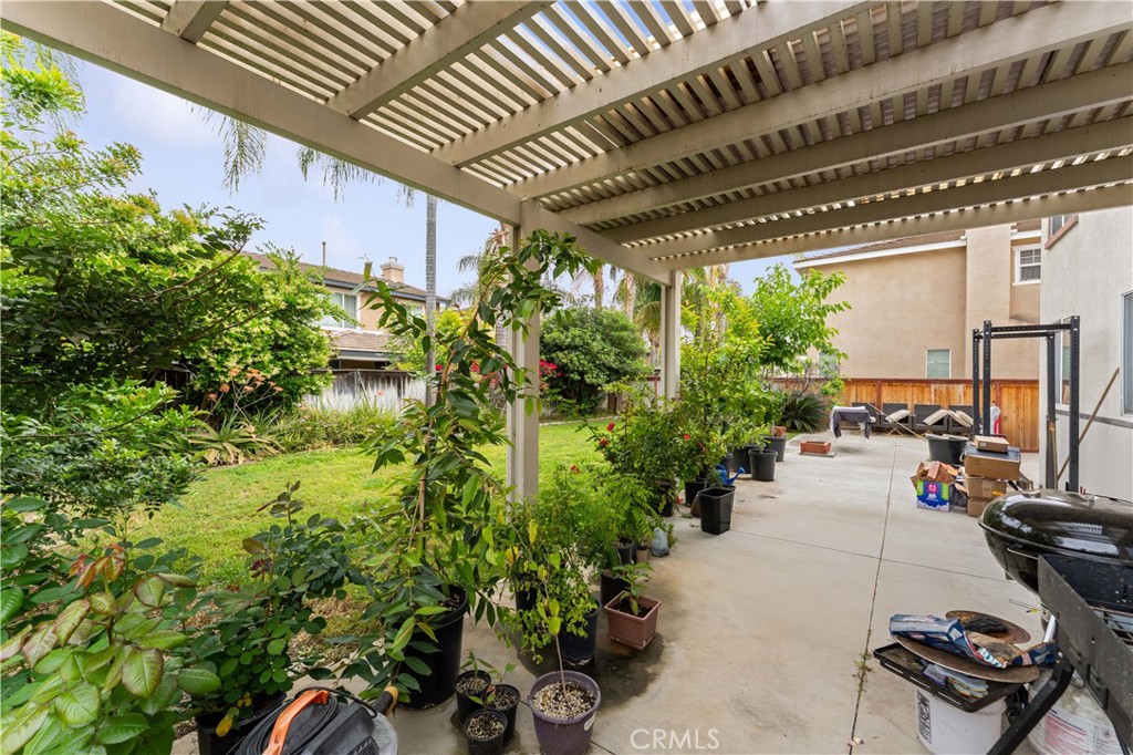 11390 Parkfield Court Riverside, CA 92505 - Photo 32 of 42 a view of a porch with furniture and garden