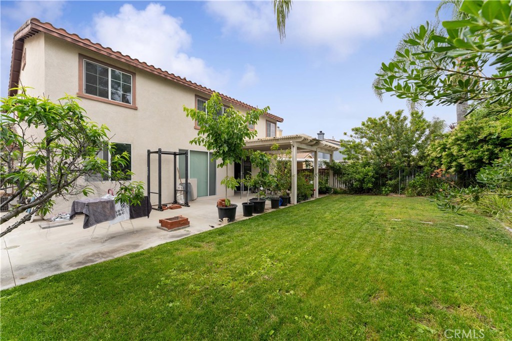 11390 Parkfield Court Riverside, CA 92505 - Photo 33 of 42 a view of a house with backyard and sitting area