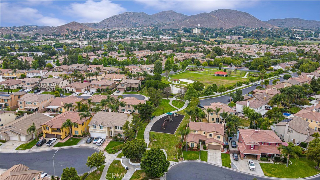 11390 Parkfield Court Riverside, CA 92505 - Photo 38 of 42 an aerial view of a city with lots of residential buildings