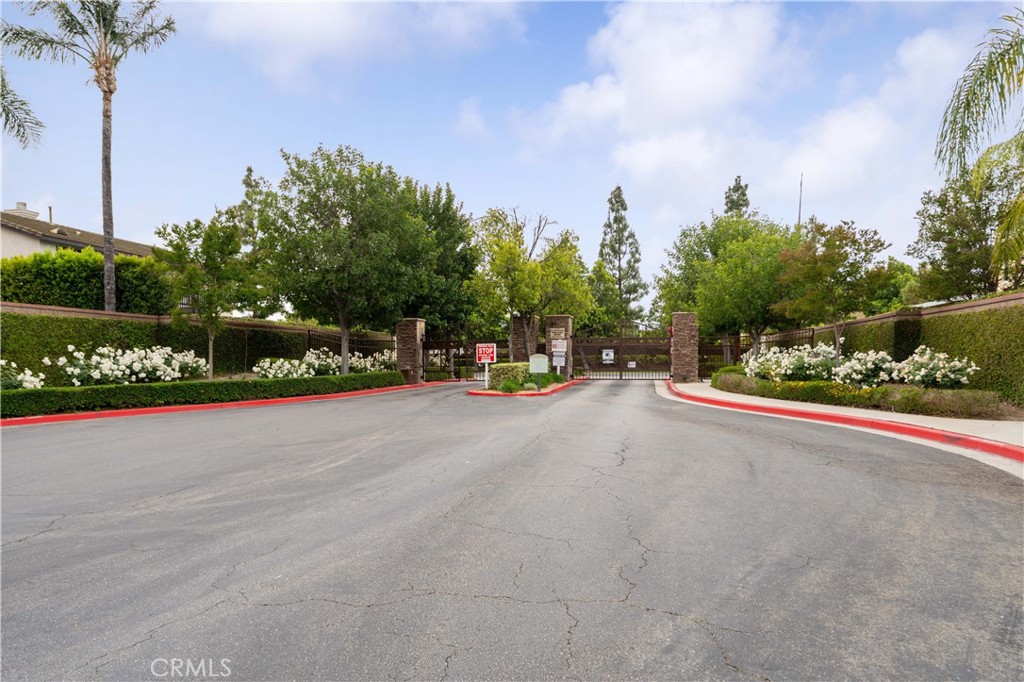 11390 Parkfield Court Riverside, CA 92505 - Photo 40 of 42 a view of a street with houses