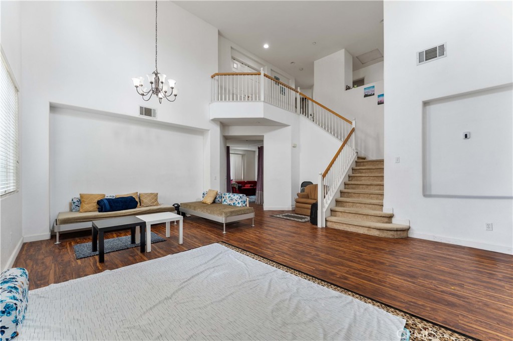11390 Parkfield Court Riverside, CA 92505 - Photo 9 of 42 a view of a livingroom with furniture and staircase