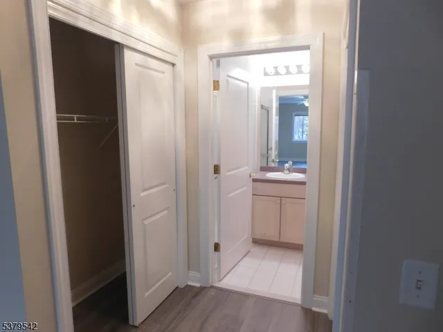 a bathroom with a sink and mirror
