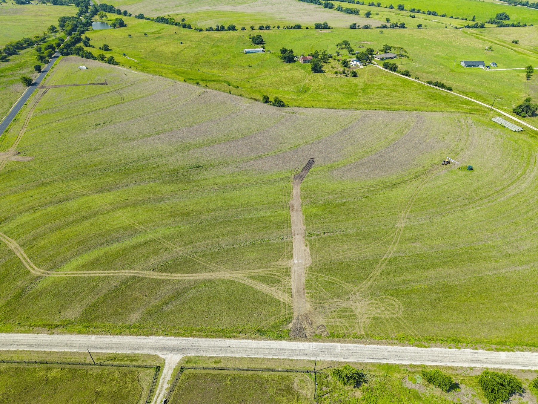1 County Road 327 Road Granger, TX 76530 - Photo 16 of 27 Vast rolling green pastures and open farmland stretch across this expansive countryside acreage.
