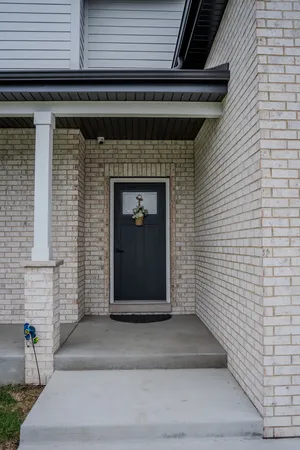 a front view of a house with a door