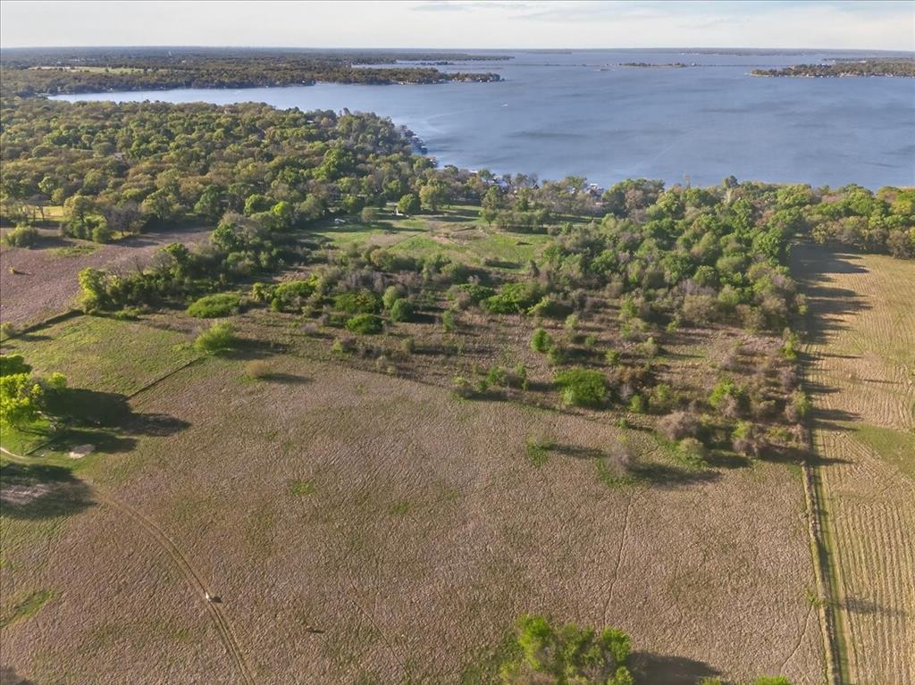 696 East Will White Road Tool, TX 75143 - Photo 16 of 18 a view of a field with an ocean view