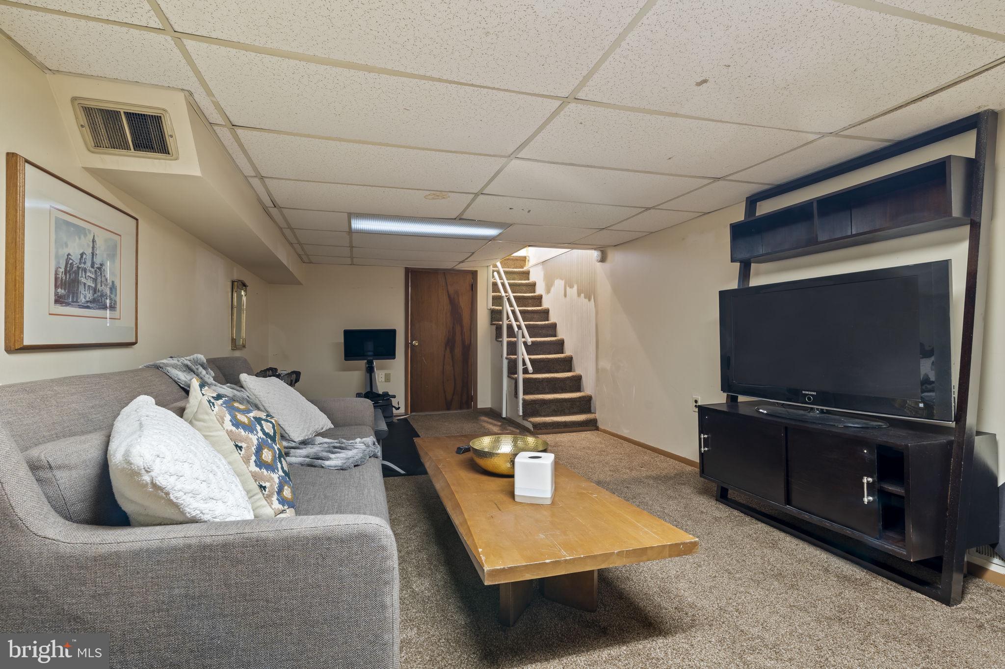 237 7th Avenue Haddon Heights, NJ 08035 - Photo 16 of 35 a living room with furniture and a flat screen tv