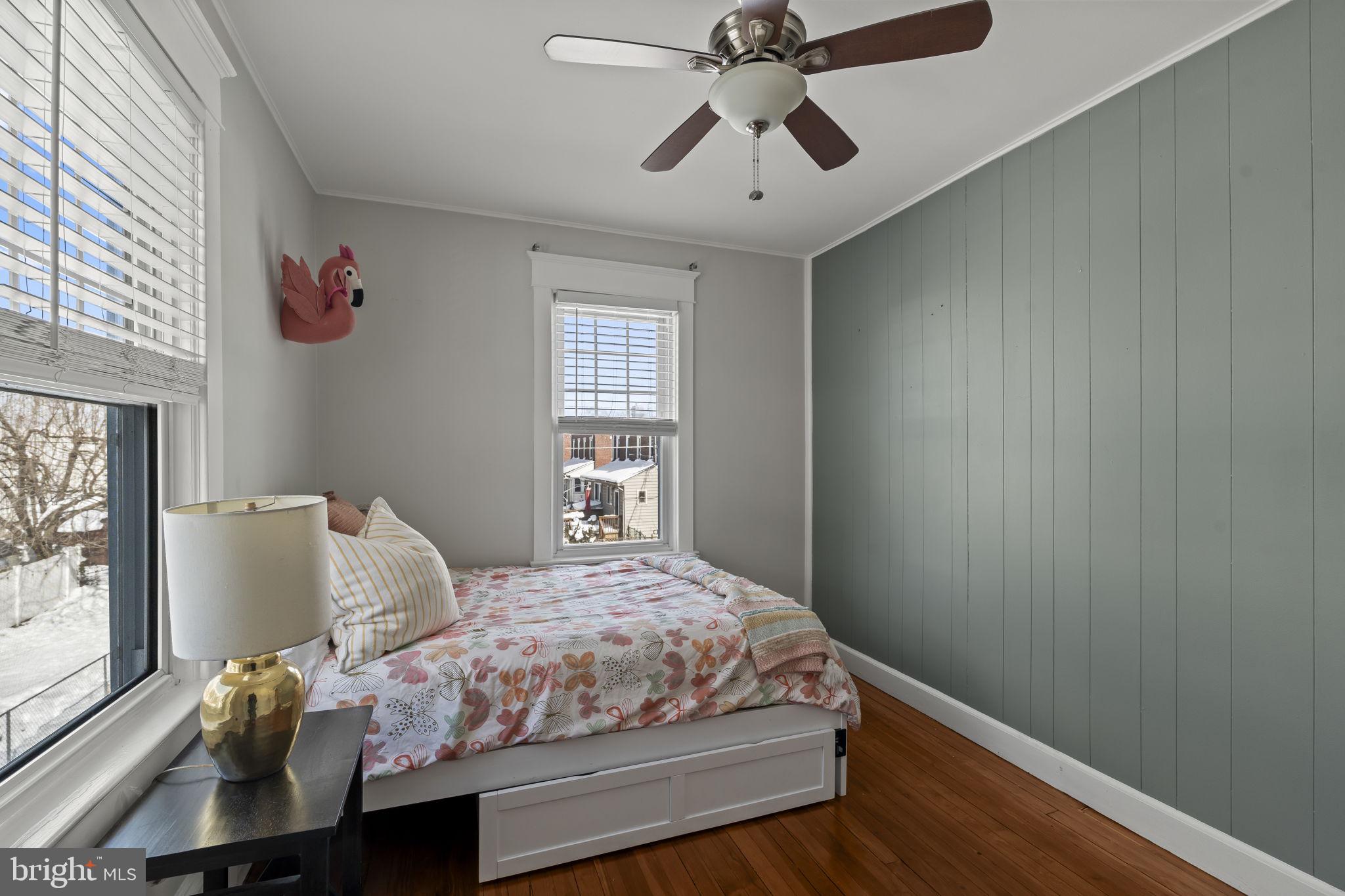 237 7th Avenue Haddon Heights, NJ 08035 - Photo 21 of 35 a bedroom with a bed and wooden floor