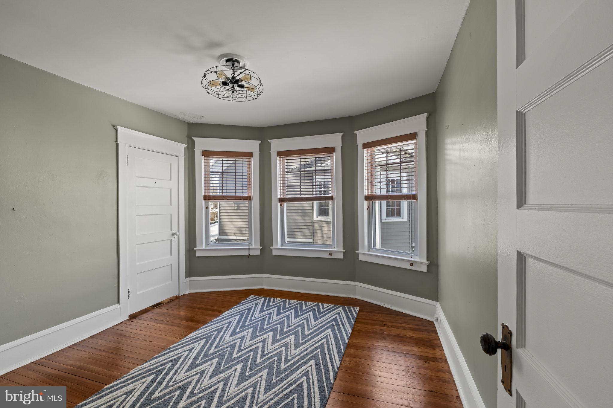 237 7th Avenue Haddon Heights, NJ 08035 - Photo 22 of 35 a view of a livingroom with wooden floor and a window