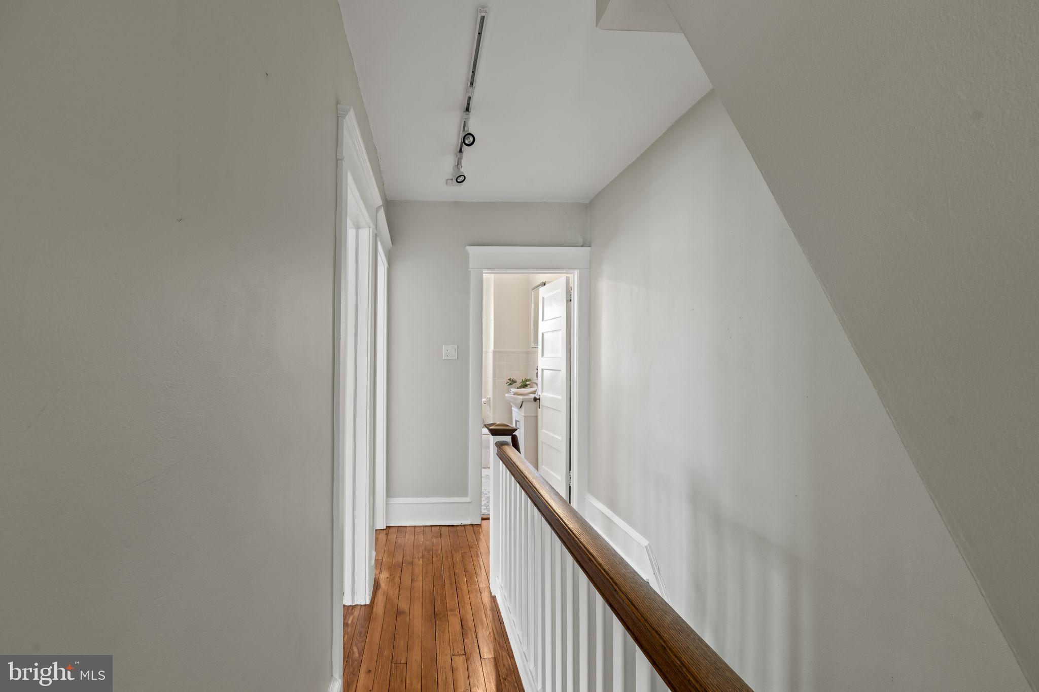 237 7th Avenue Haddon Heights, NJ 08035 - Photo 24 of 35 a view of a hallway with wooden floor
