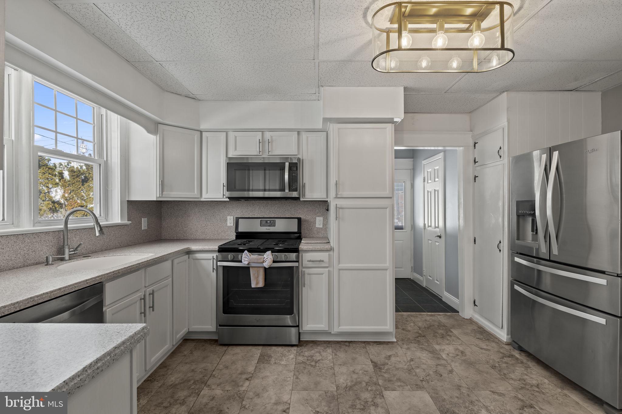 237 7th Avenue Haddon Heights, NJ 08035 - Photo 10 of 35 a kitchen with a sink appliances and cabinets