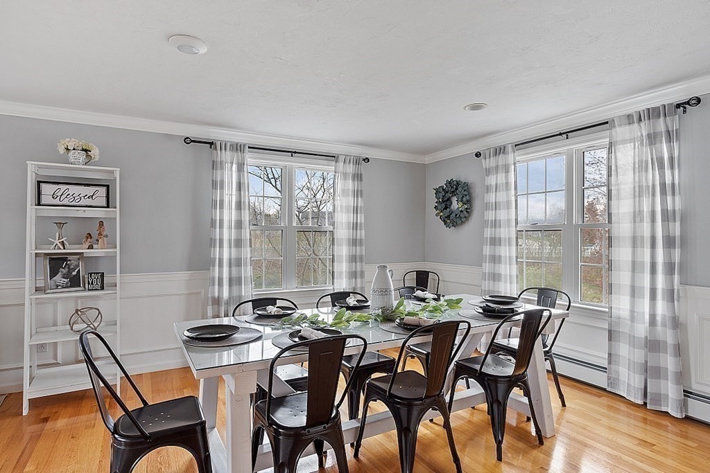 3 William Circle Rutland, MA 01543 - Photo 12 of 42 a view of a dining room with furniture and wooden floor