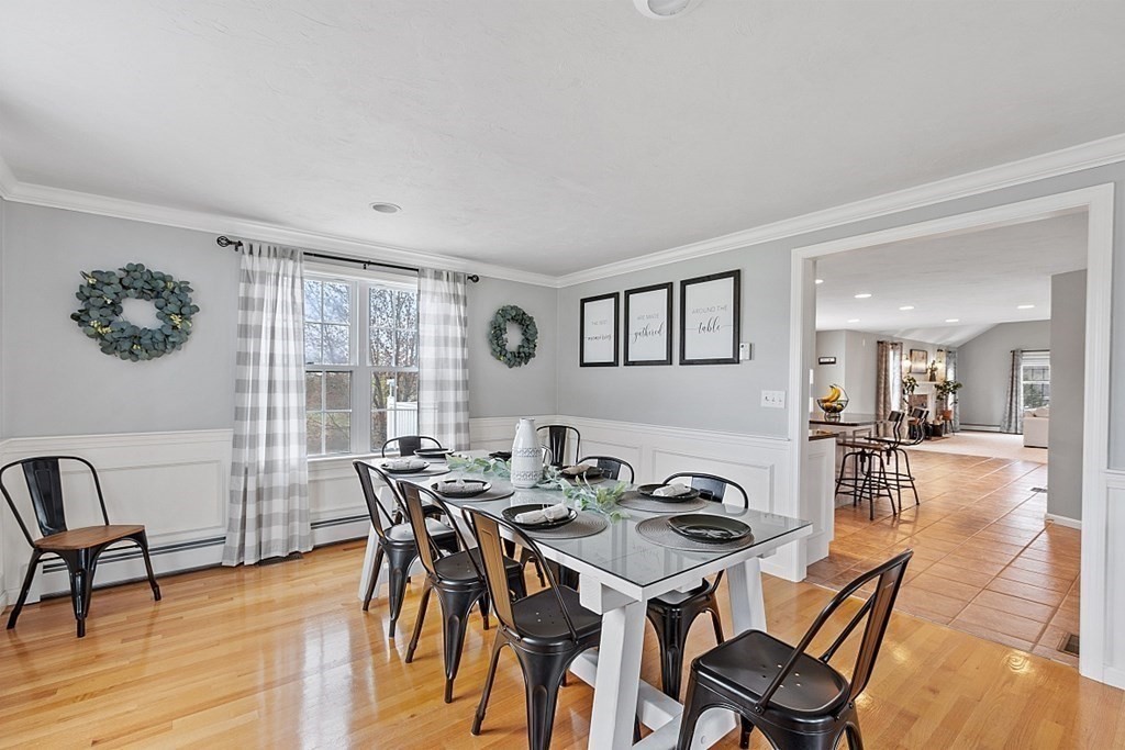 3 William Circle Rutland, MA 01543 - Photo 13 of 42 a view of a dining room with furniture and wooden floor
