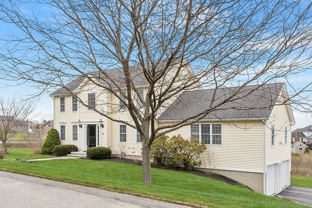 3 William Circle Rutland, MA 01543 - Photo 2 of 42 a front view of a house with a yard