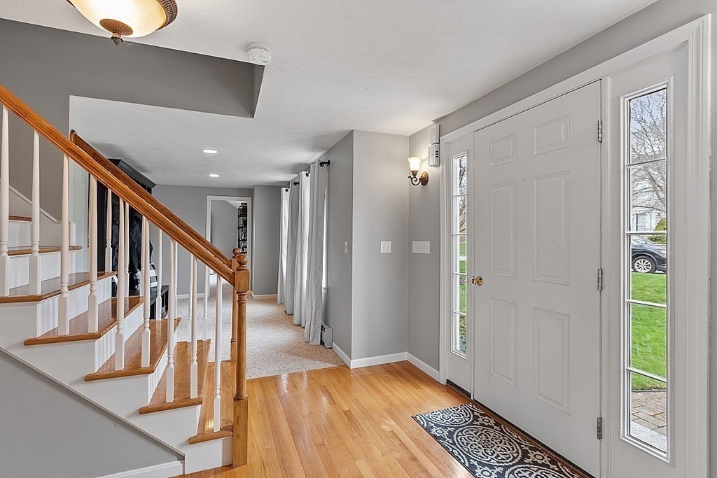 3 William Circle Rutland, MA 01543 - Photo 21 of 42 a view of entryway with wooden floor and stairs