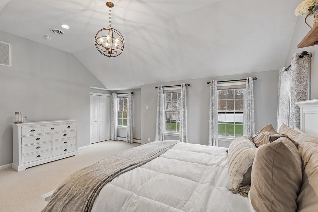3 William Circle Rutland, MA 01543 - Photo 23 of 42 a bedroom with a large bed and a window