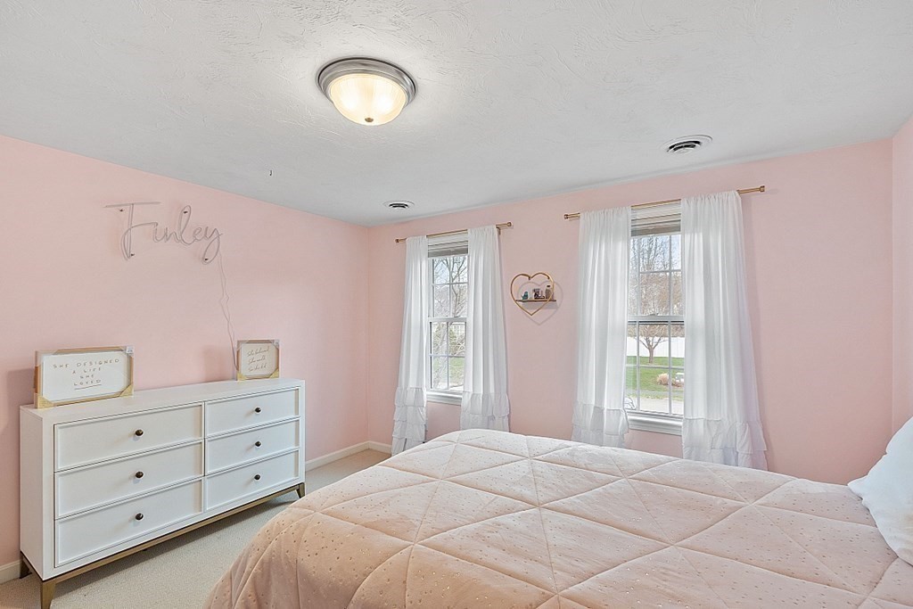 3 William Circle Rutland, MA 01543 - Photo 29 of 42 a bedroom with a bed and a dresser