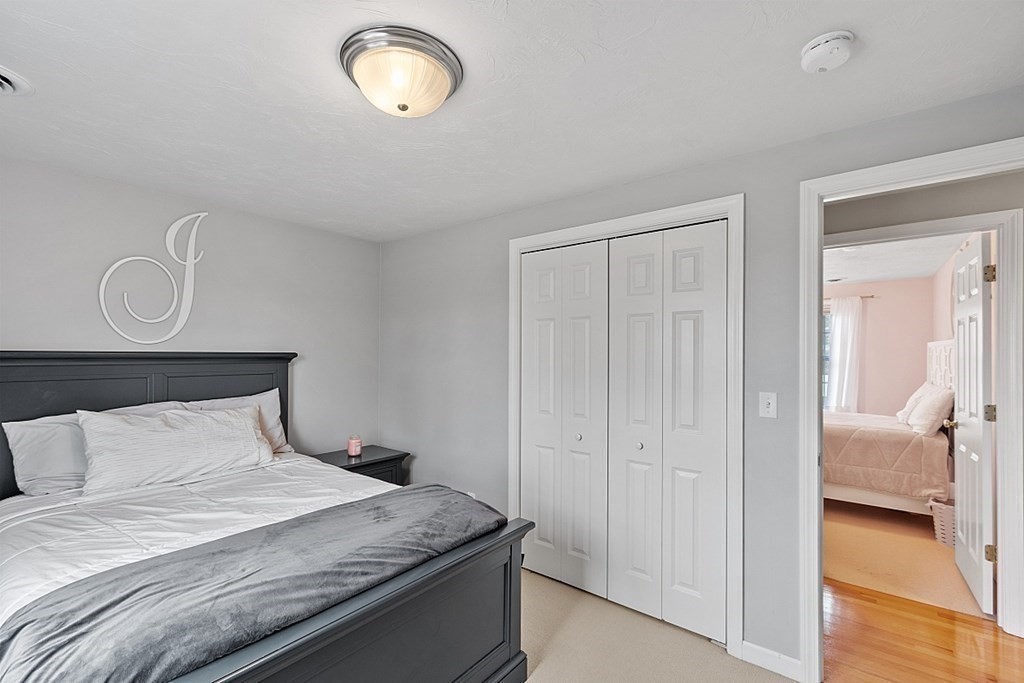 3 William Circle Rutland, MA 01543 - Photo 30 of 42 a bedroom with a bed and a walk in closet