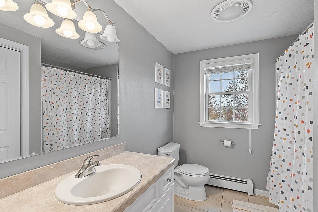 3 William Circle Rutland, MA 01543 - Photo 32 of 42 a bathroom with a sink a toilet and shower