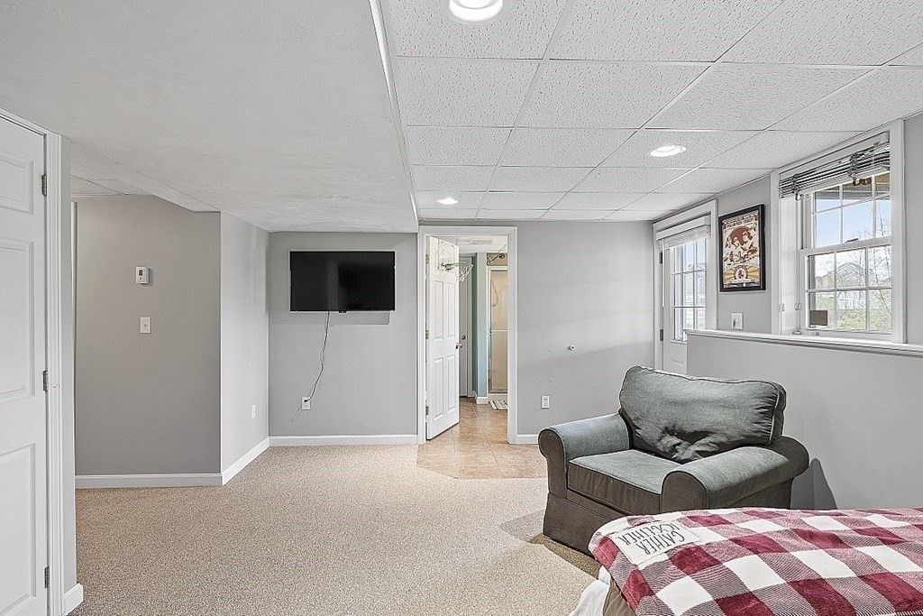 3 William Circle Rutland, MA 01543 - Photo 34 of 42 a living room with furniture and a flat screen tv