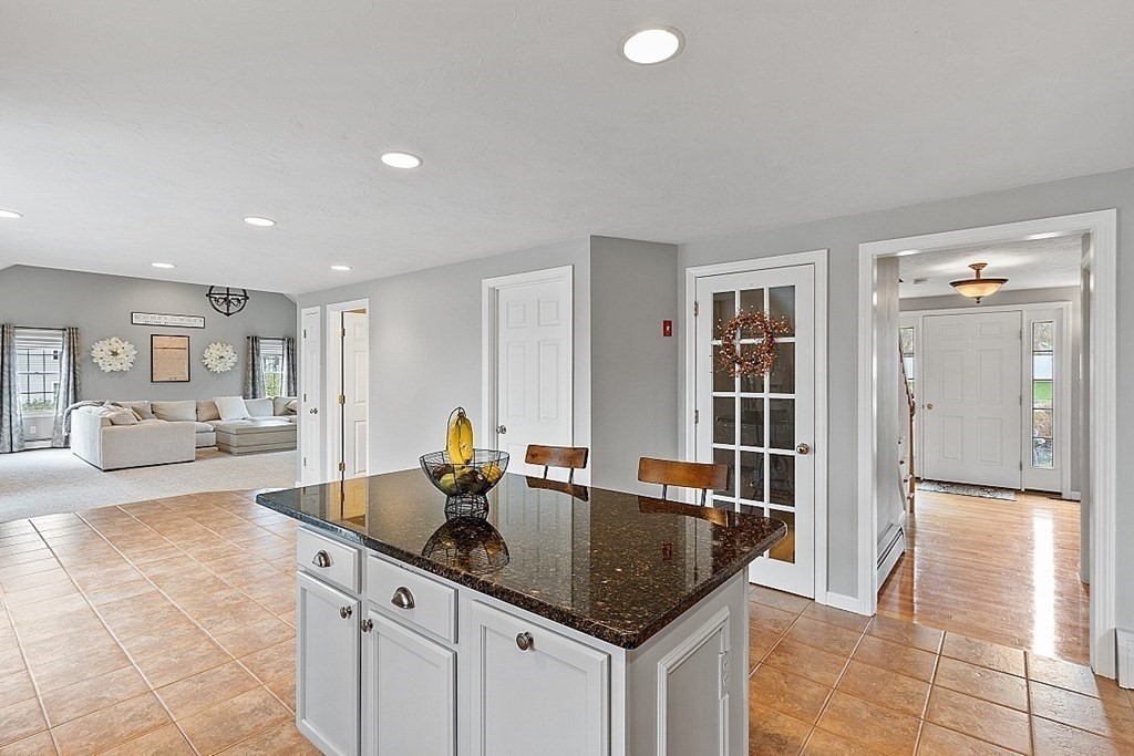 3 William Circle Rutland, MA 01543 - Photo 8 of 42 a kitchen with granite countertop a sink and cabinets