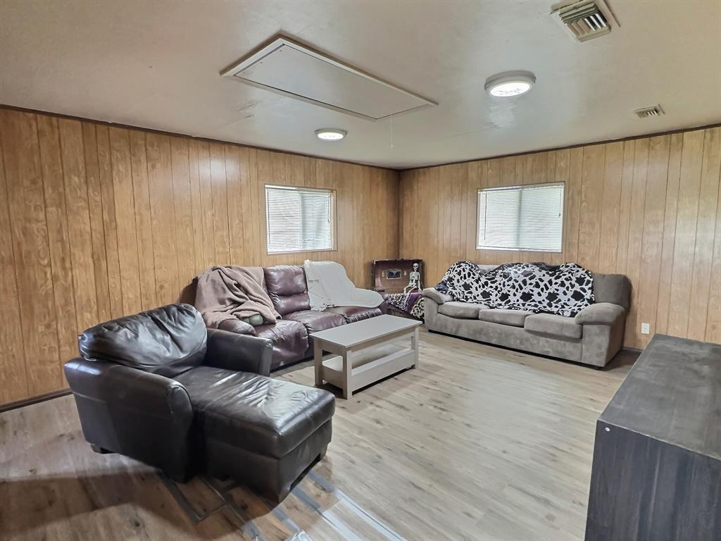 5401 Highway 36 Comanche, TX 76442 - Photo 6 of 22 a spacious bedroom with a bed and a couch