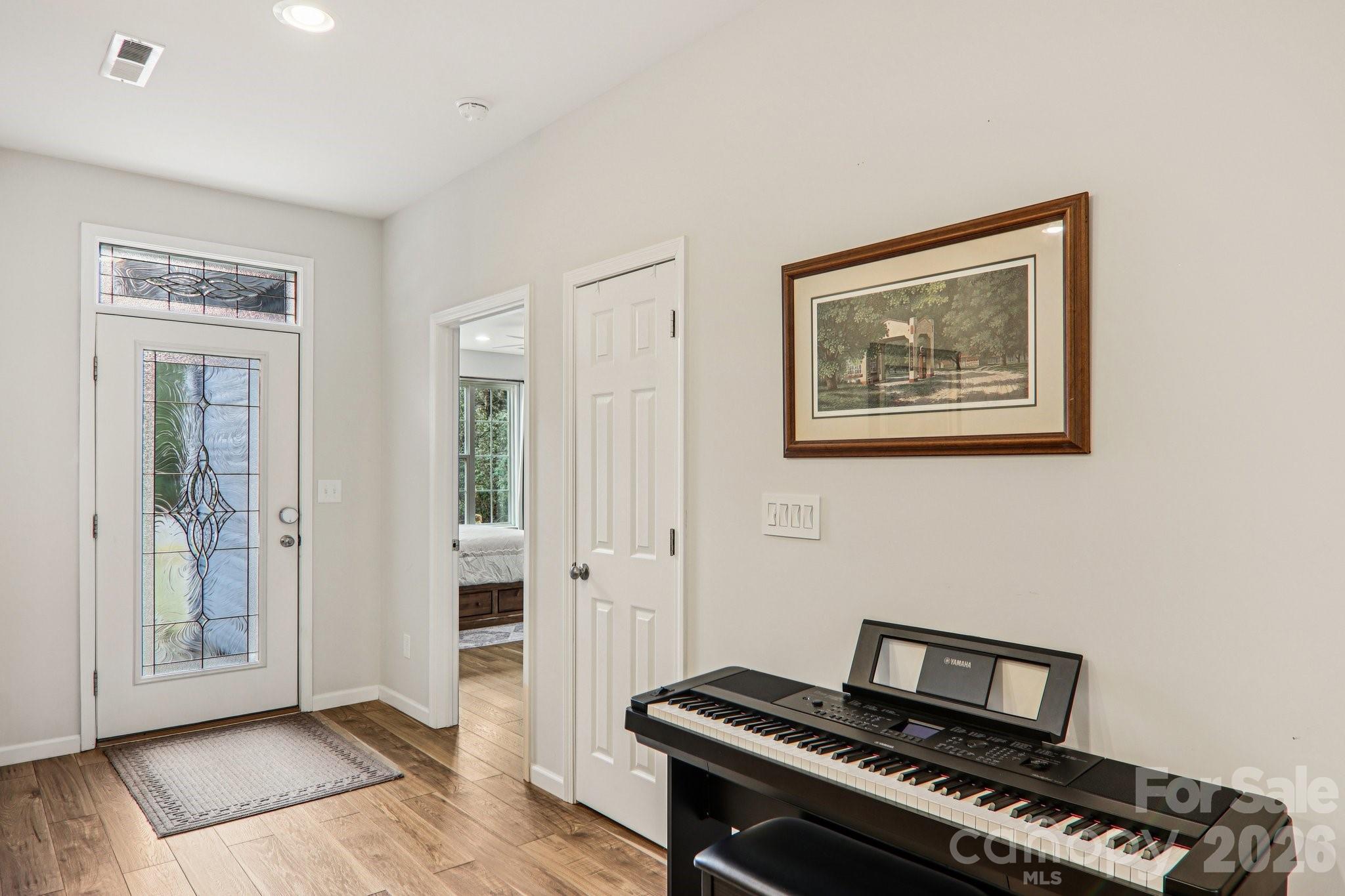 29 Saddle Top Road Flat Rock, NC 28731 - Photo 22 of 46 a view of an empty room with wooden floor