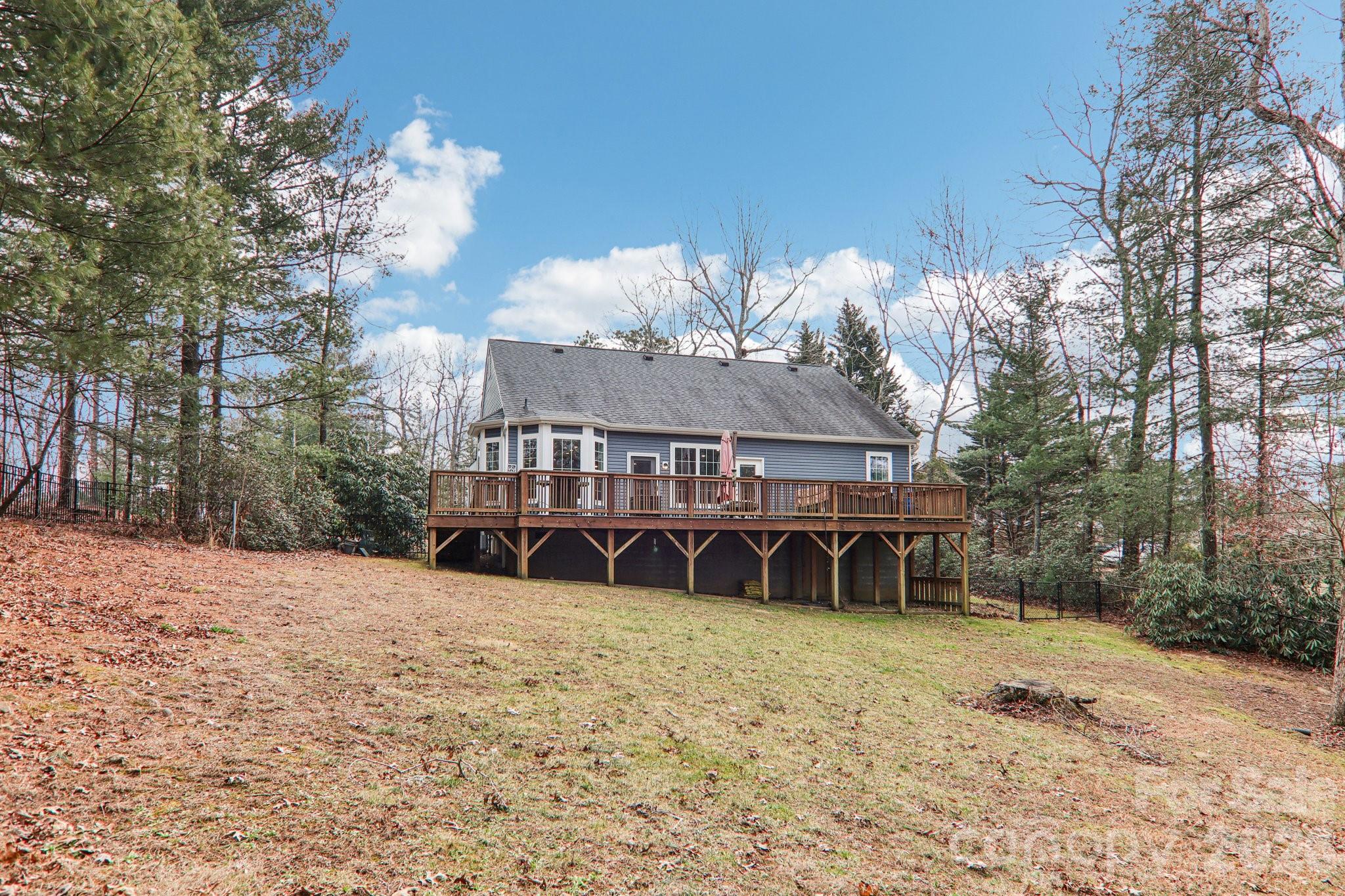 29 Saddle Top Road Flat Rock, NC 28731 - Photo 37 of 46 a view of a house with a yard