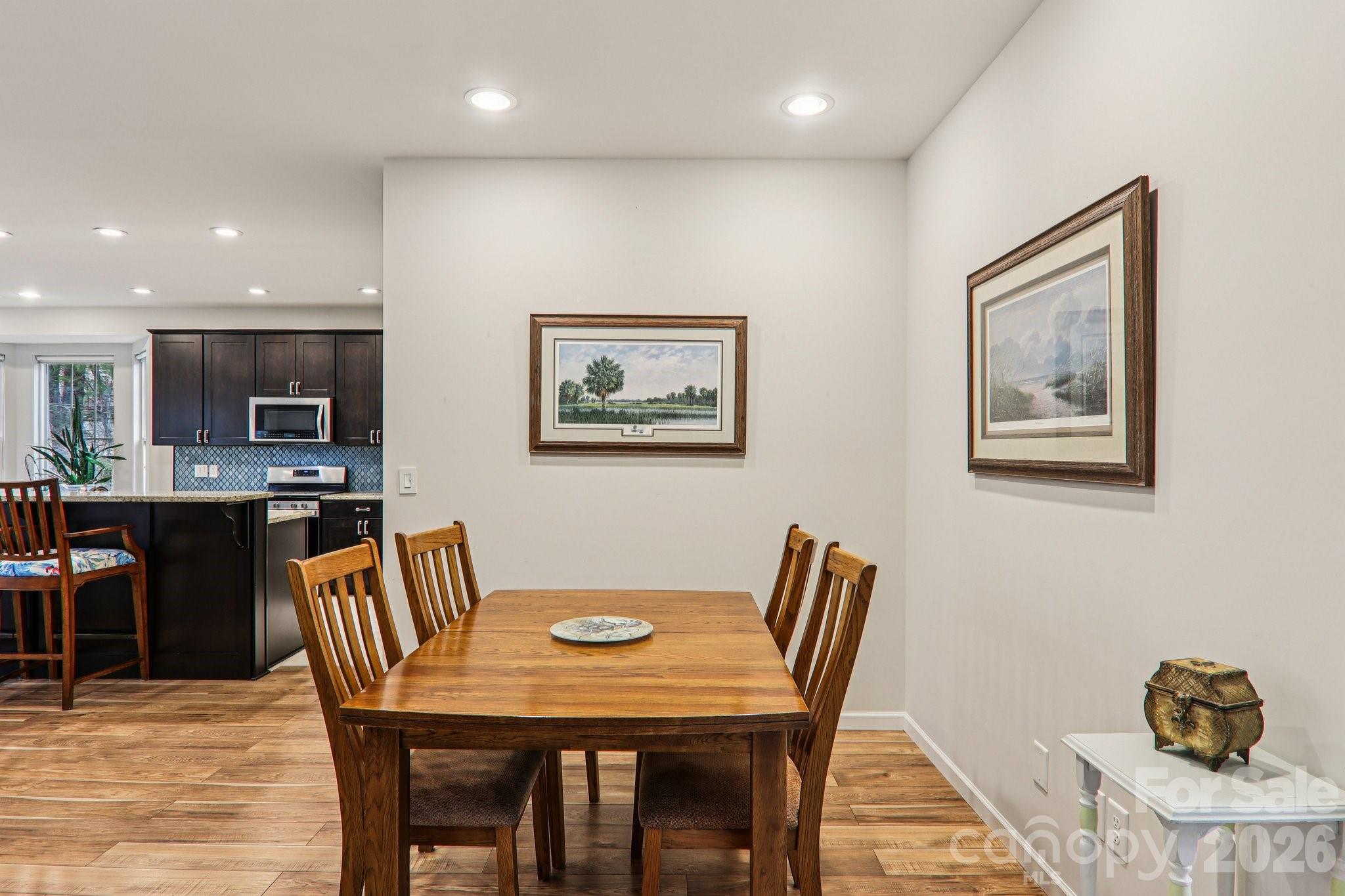 29 Saddle Top Road Flat Rock, NC 28731 - Photo 9 of 46 a view of a dining room with furniture