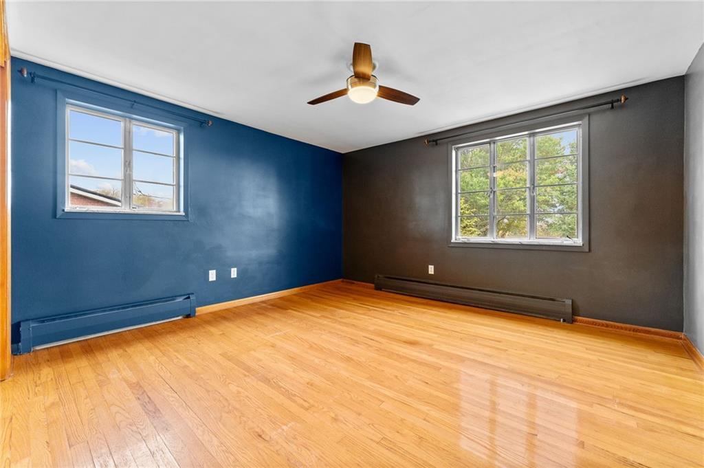 409 4th Street McDonald, PA 15057 - Photo 17 of 37 a view of an empty room with a window