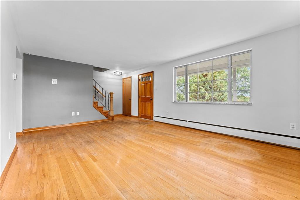 409 4th Street McDonald, PA 15057 - Photo 5 of 37 a view of an empty room with a window