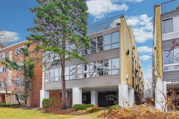 a view of a building with a tree