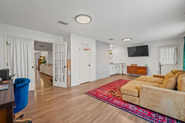 a bathroom with a bathtub and a sink