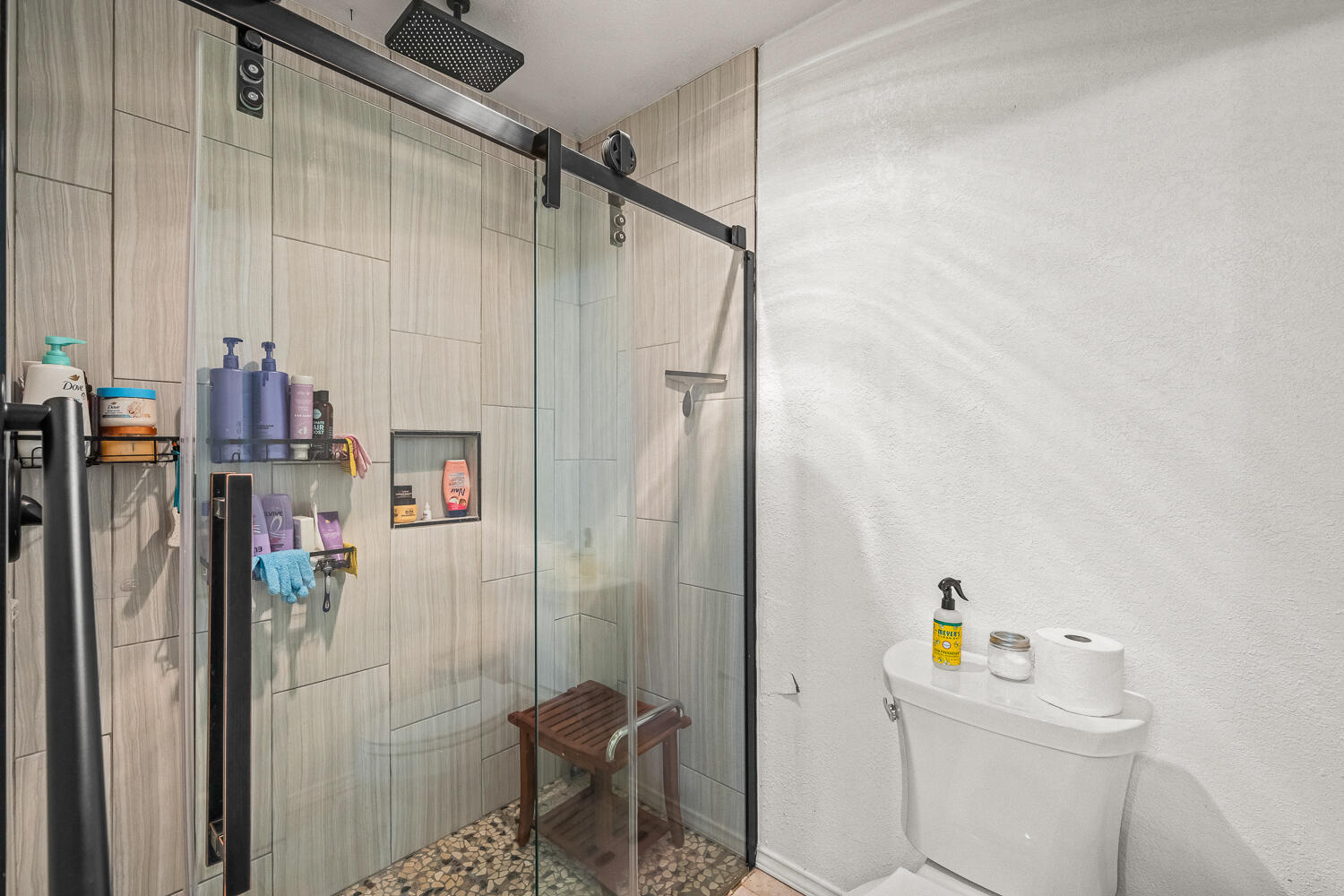 3410 94th Street Lubbock, TX 79423 - Photo 39 of 57 a bathroom with a sink toilet and shower