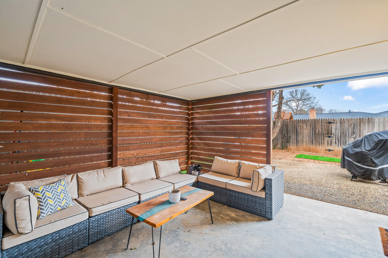 3410 94th Street Lubbock, TX 79423 - Photo 50 of 57 a living room with furniture and a large window