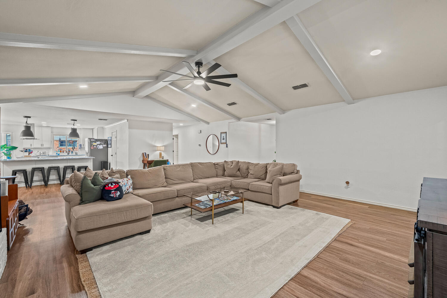 3410 94th Street Lubbock, TX 79423 - Photo 7 of 57 a living room with furniture and a couch