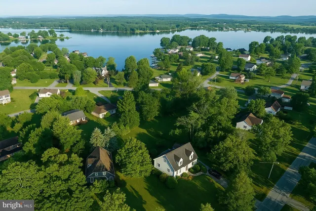 a picture of a bench in front of a building