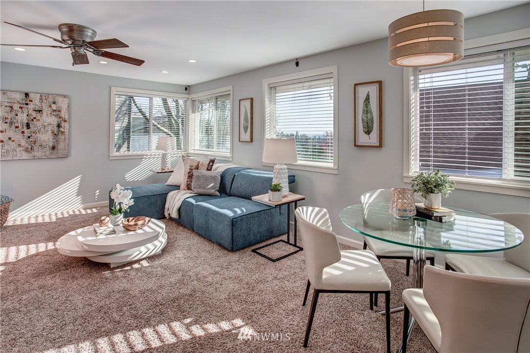 2400 East Howell Street, Unit E Seattle, WA 98122 - Photo 2 of 39 a living room with furniture and a table