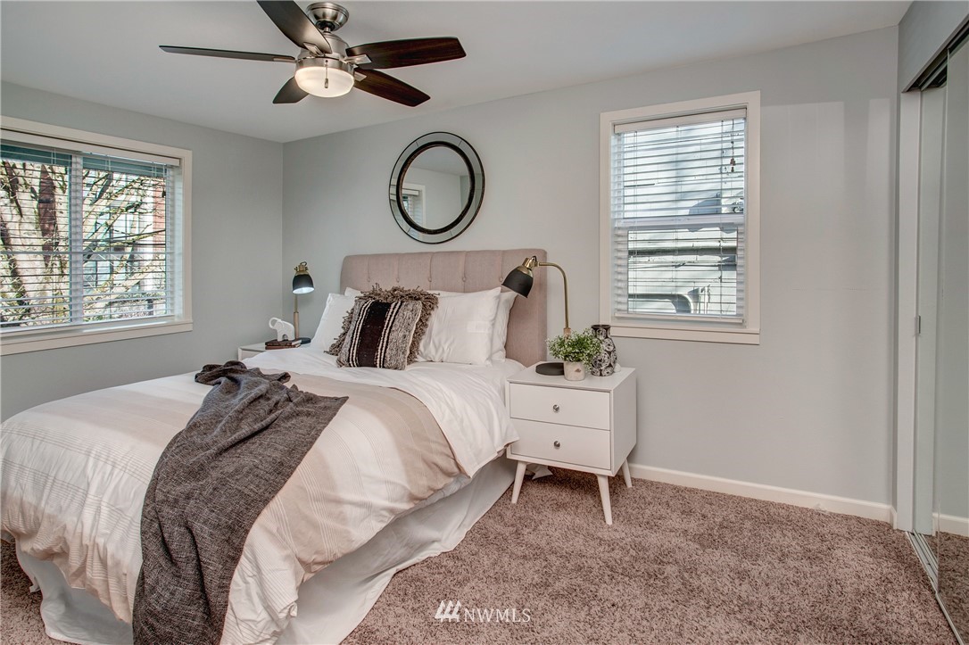 2400 East Howell Street, Unit E Seattle, WA 98122 - Photo 15 of 39 a bedroom with a bed and a window