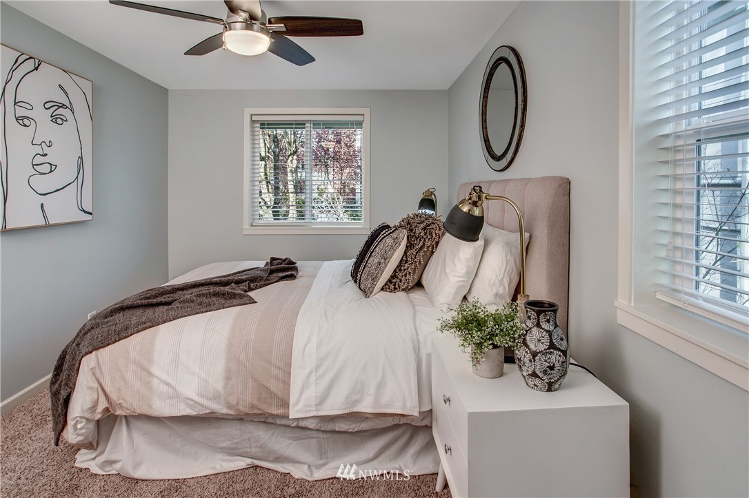 2400 East Howell Street, Unit E Seattle, WA 98122 - Photo 17 of 39 a bedroom with a bed and a window