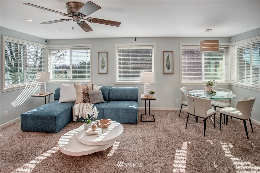 2400 East Howell Street, Unit E Seattle, WA 98122 - Photo 23 of 39 a living room with furniture and a large window