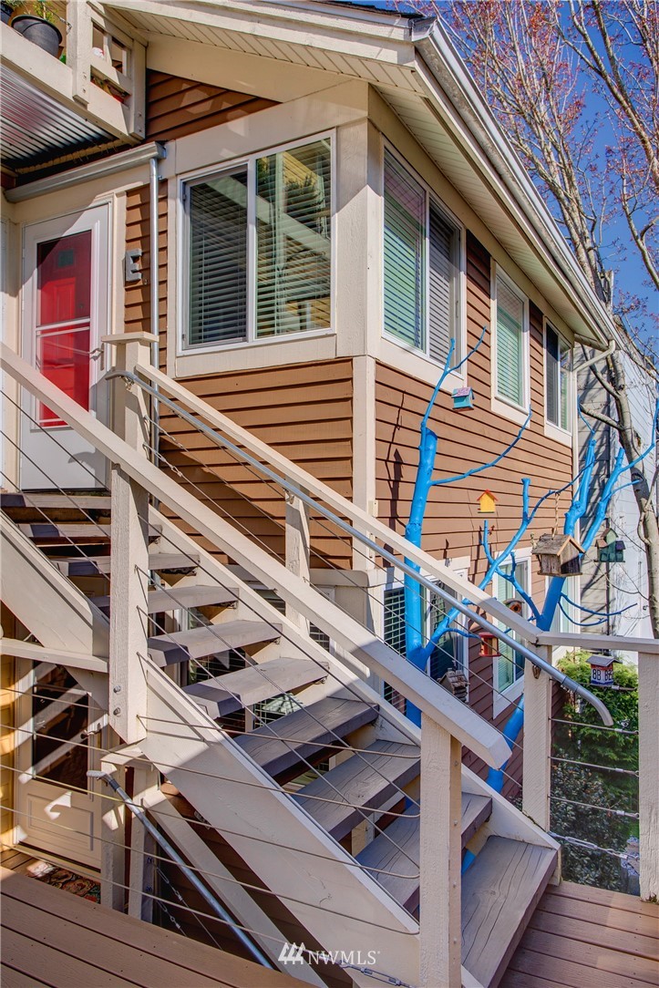 2400 East Howell Street, Unit E Seattle, WA 98122 - Photo 26 of 39 a view of a house with pool and windows