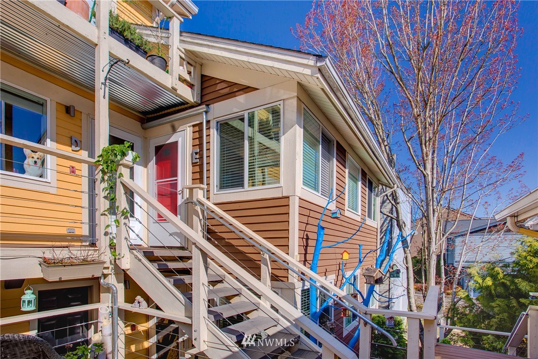 2400 East Howell Street, Unit E Seattle, WA 98122 - Photo 27 of 39 a front view of a house with a street