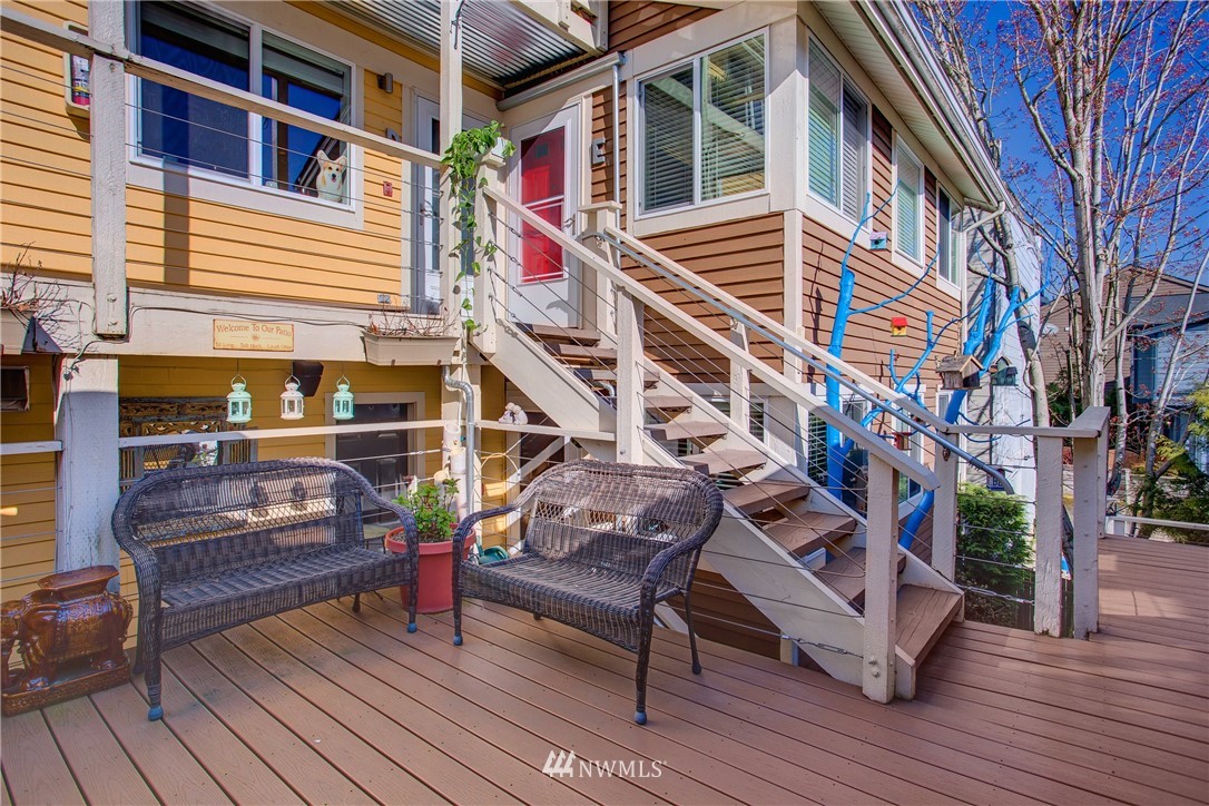 2400 East Howell Street, Unit E Seattle, WA 98122 - Photo 30 of 39 a view of outdoor seating space with wooden floor and stairs