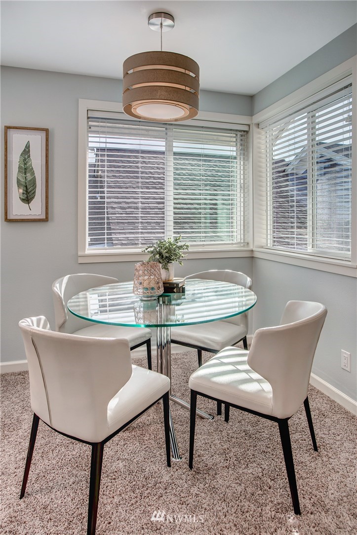 2400 East Howell Street, Unit E Seattle, WA 98122 - Photo 4 of 39 a dining room with furniture and window